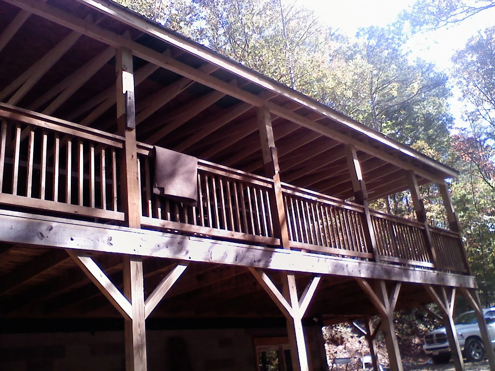 Timber framing under a new elevated porch and deck — Roof Leak Repair in Altus by Roofing Brothers